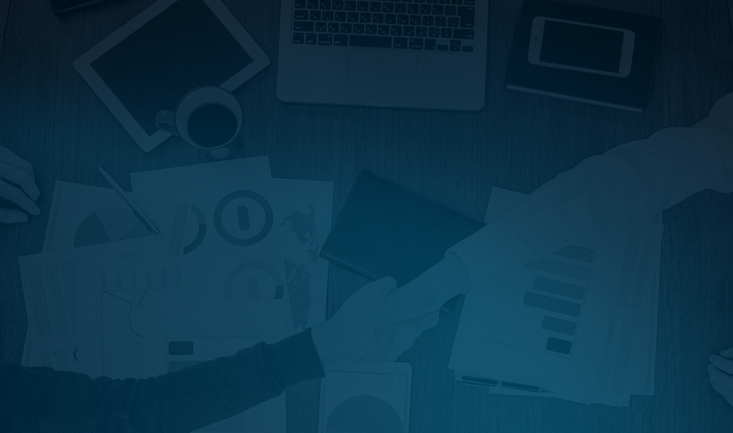 Business meeting with documents and devices